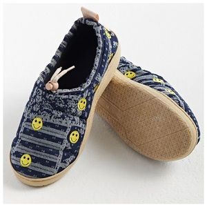 Urban Outfitters patchwork hard-sole slippers with happy face